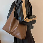 Elina – Elegantní minimalistická hnědá kabelka přes rameno Karolina Prague